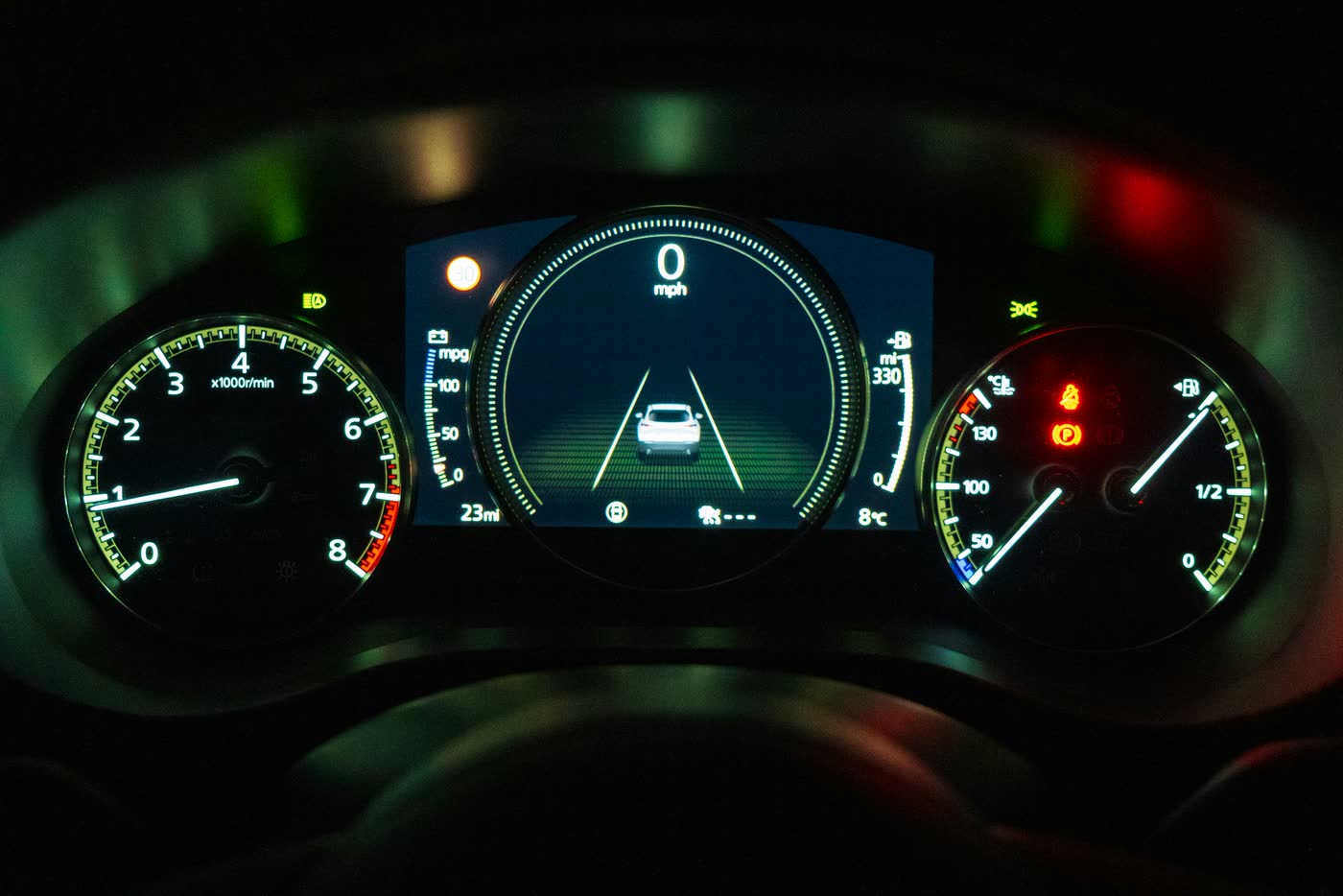 Illuminated car dashboard and instrument cluster